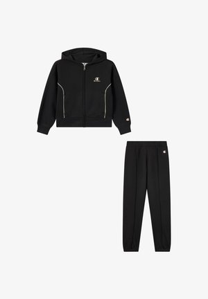 Schwarze Fleece-Zip-Up-Jacke mit weißem Paspel und Logo, kombiniert mit schwarzen Jogginghosen mit elastischem Bund und Logo-Akzenten.