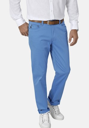 Light blue cotton trousers with a straight leg, featuring side pockets and a brown belt. Paired with white sneakers and a white shirt.