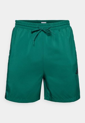 adidas Sportswear ESSENTIAL THREE STRIPES CHELSEA SHORT - Korte sportsbukser - collegiate green/black