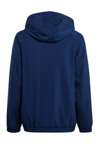 Veste à capuche navy avec des manches longues, des poignets élastiques, un matériau léger, une texture lisse et un ourlet inférieur resserré. Pas de graphiques visibles.