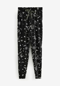 Pantaloni de jogging negri cu modele albe care includ stele, inimi și păsări. Au un talie elastică cu șnur și manșete la glezne.