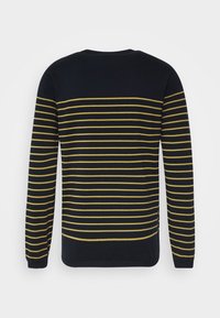 Maglione a maniche lunghe blu navy con righe orizzontali gialle. Texture morbida con scollatura rotonda e spacchi ai lati dell'orlo.