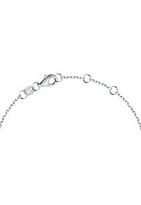 Silver metallkedja armband med små cirkulära länkar och en kräftklämma, vilket indikerar hållbarhet och en delikat, lätt design.