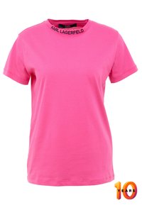 Rosa Baumwoll-T-Shirt mit Rundhalsausschnitt, mit schwarzem "Karl Lagerfeld"-Logo am Kragen. Kurze Ärmel und lockere Passform.
