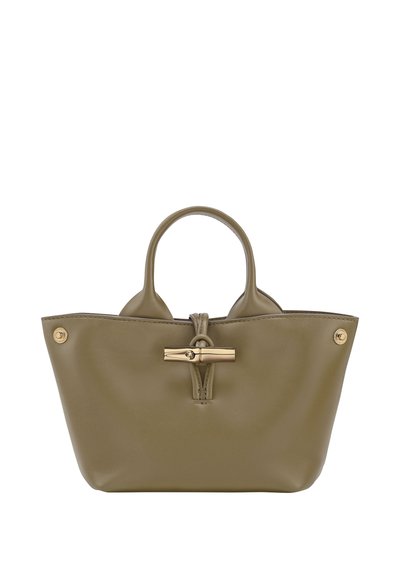 Olive green leather handbag with a structured shape, double handles, gold hardware, and a decorative clasp at the center.