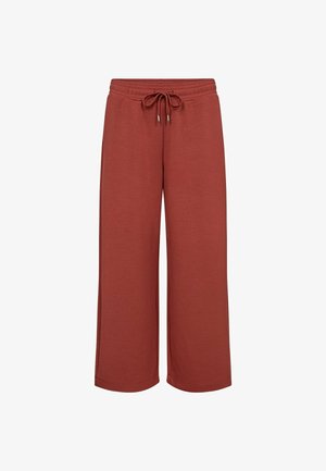 Hnědé kalhoty s širokým nohavicemi vyrobené z měkké látky s elastickým pasem a šňůrkou. Obsahují boční kapsy a mají hladkou texturu.