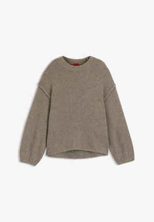 Vaaleanbeige neulottu villapaita, jossa on pyöreä pääntie, laskeutuvat olkapäät ja pitkät, hieman puffatut hihat. Värjätty helma ja hihansuut.