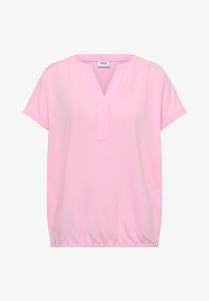 Jasnoróżowa bluzka z krótkim rękawem, z dekoltem w kształcie litery V, luźnym krojem i elastycznym dołem, z metką marki "Cecil" wewnątrz kołnierza.