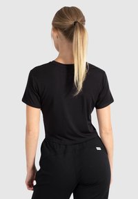 Smilodox CROP - T-shirts print - schwarz