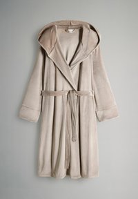 Beige hooded bathrobe in soft, plush fabric, featuring long sleeves, a belted waist, and a shawl collar. Smooth texture with no visible patterns.