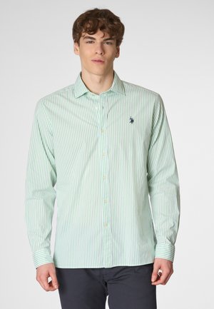 Camicia a righe verde chiaro con bottoni in cotone. Caratterizzata da un colletto classico, maniche lunghe e un piccolo logo blu scuro sul petto.