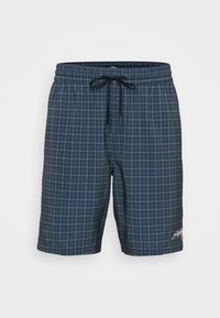 Sötétkék fürdőshorts hálós mintával, rugalmas derekkal és húzózsinórral. A bal alsó oldalon egy kis logó található.