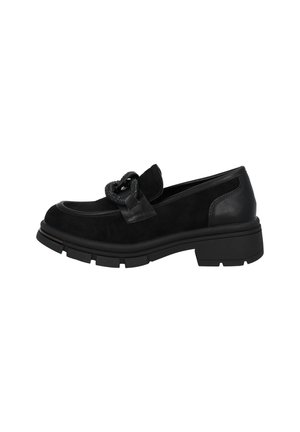 Sorte ruskind loafers med rund tå, dekorativ læderdetalje og tykk sort gummisål. Sidevægten fremhæver det slanke design og teksturen.