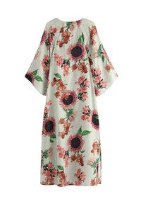 Blomsterkjole lavet af letvægtsstof. Har en cremet baggrund med pink og lilla solsikker, blomster og grønne blade.