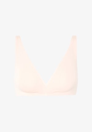 Brezšivni, svetlo bež brezžični modrček s širokimi naramnicami in globokim V-izrezom.