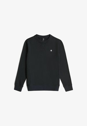 Sweat-shirt noir à manches longues avec col rond, poignets et ourlet côtelés, et petit logo blanc sur la poitrine gauche.