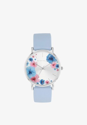 Silberne Uhr mit hellblauem Armband, verziert mit blauen und pinken Blumenmustern auf dem Zifferblatt, mit dünnen silbernen Stunden- und Minutenzeigern.