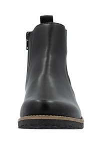 Bottine en cuir noir avec une texture lisse, fermeture éclair à l'avant, panneaux latéraux élastiques et semelle en caoutchouc avec un accent beige autour du bord.