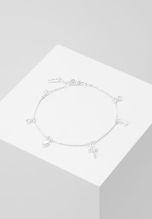 Silver bracelet with a chain design, featuring charms: an anchor, heart, cross, and a crystal. Smooth texture, clasp closure.