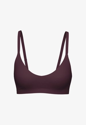 Reggiseno viola con scollatura profonda, sottili spalline regolabili e un tessuto liscio e elastico. Presenta un design senza cuciture e senza imbottitura.