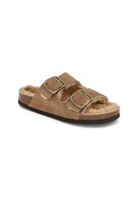 Sandali scivolati in suede marrone con due cinturini regolabili, morbida fodera in pelle ecologica e suola in sughero testurizzata. Design resistente e leggero.