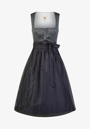 Traditionele mouwloze dirndl-jurk met een grijze lijfje met patroon, een voorrits en een effen donkerblauwe schort die met een strik rond de taille is gebonden.