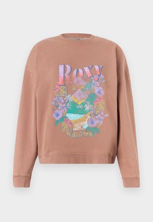Light brown sweatshirt with colorful floral and mountain design, "Roxy" text, and "1990" year printed on front.