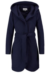 Mörkblå huva kappa i mjukt material, med en knytbälte, två framfickor och kurviga sömmar för en strömlinjeformad look.