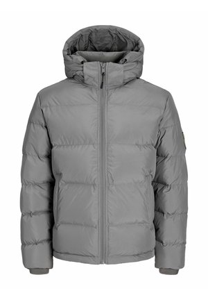 Szürke puffermellény cipzáras fronttal, állítható kapuccsal és bordázott mandzsettákkal. Tűzött kialakítással rendelkezik, sima textúrájú és látható minták nélkül.