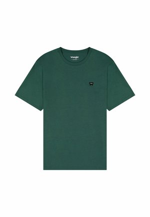 T-shirt verde in cotone con maniche corte e collo rotondo, caratterizzata da un piccolo logo nero sul petto e una superficie liscia.