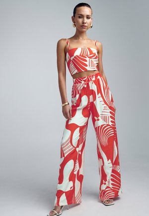 KADY - Stoffhose - red abstract