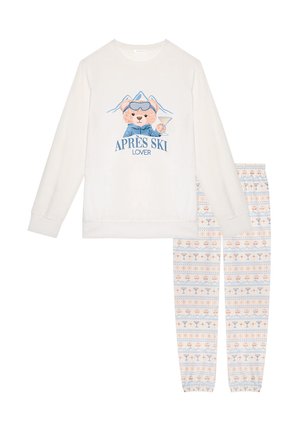 Long-sleeve cream top with bear graphic and "APRES SKI LOVER" text, paired with patterned pajama pants featuring cocktails and snowflakes.