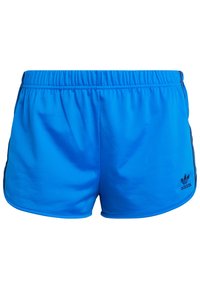 Modré sportovní šortky z hladké, lehké tkaniny. Mají elastický pas a malé černé logo na dolní levé straně.