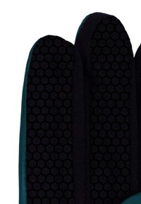 Nahaufnahme von schwarzem Stoff mit hexagonalen Strukturen und türkisfarbenem Rand an den Kanten.