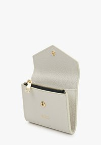Light gray leather wallet with textured finish, gold hardware, and a hexagonal flap. Features a zippered compartment and embossed logo.