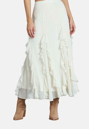 Gonna maxi plisè bianca con accentuazioni a volant lungo le cuciture laterali, design a strati e finitura leggermente trasparente.