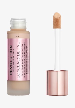 Fond de teint liquide dans une bouteille transparente avec une étiquette rose. Présente un applicateur blanc avec un embout doux et arrondi. La couleur semble beige clair.