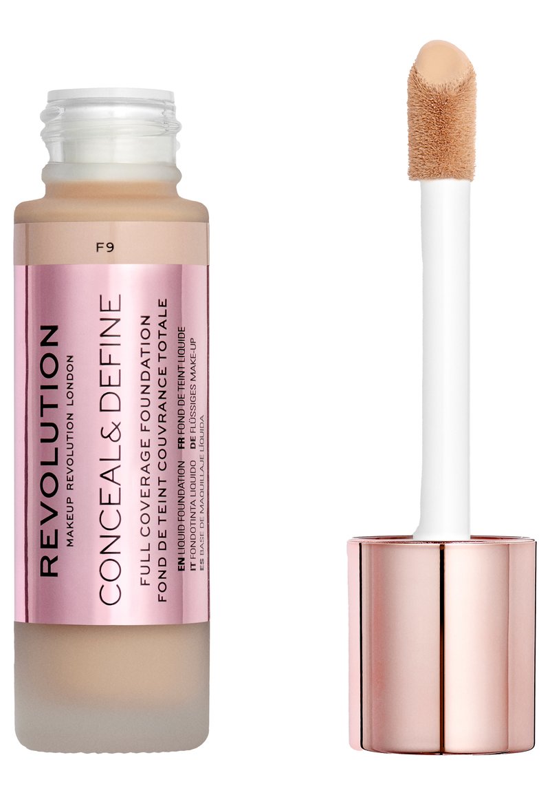 Flüssigefoundation in einer durchsichtigen Flasche mit einem rosa Etikett. Verfügt über einen weißen Applikator mit einer weichen, abgerundeten Spitze. Die Farbe erscheint hellbeige.