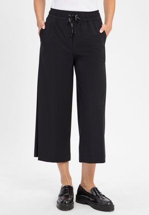 Black, cropped, wide-leg pants with elastic waistband and drawstring. Features side pockets and smooth, lightweight fabric.
