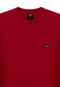 Rode sweatshirt van katoen, met een ronde halslijn en geribbelde manchetten. Zwarte Vans logo-tag op de voorkant links.
