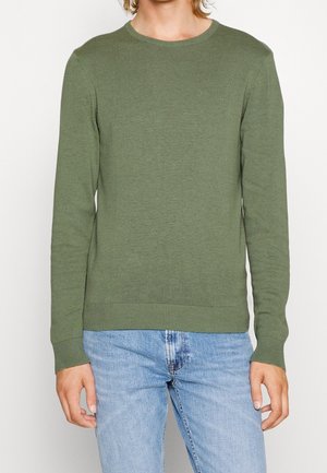 Stickad tröja - mint
