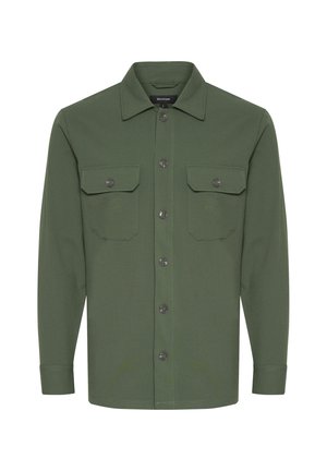 Oliivroheline pikkade varrukatega särk, millel on krae, kaks rinnataskut, nööbid ees ja tekstuuriga kangas. Omaduseks on hallid nööbid ja sirge lõige.