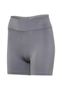 Shorts de sport gris avec une taille haute élastique, dotés de coutures plates et d'un logo discret sur la ceinture. Tissu lisse et extensible.