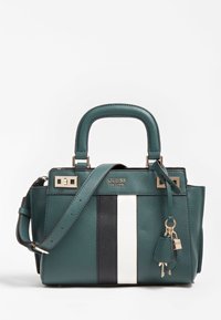 Sac à main en cuir bleu sarcelle avec deux poignées et une bandoulière amovible, présentant un design à rayures noires et blanches et des accents métalliques dorés.