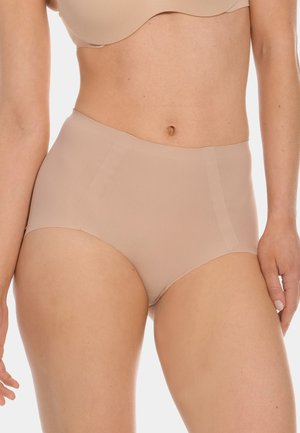 Woman wearing high-waist beige seamless underwear and matching bra, shown from mid-thigh to chest against a white background.