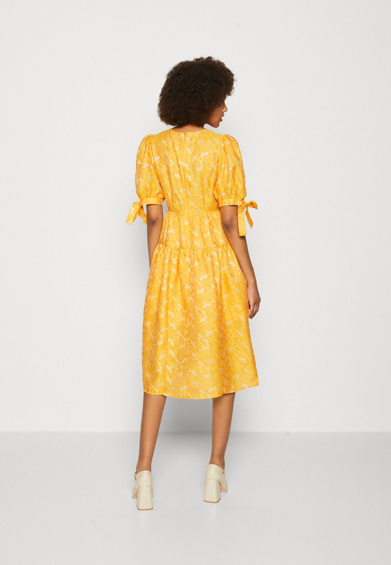 monki orange dress Monki long sleeve midi dress in orange patchwork floral