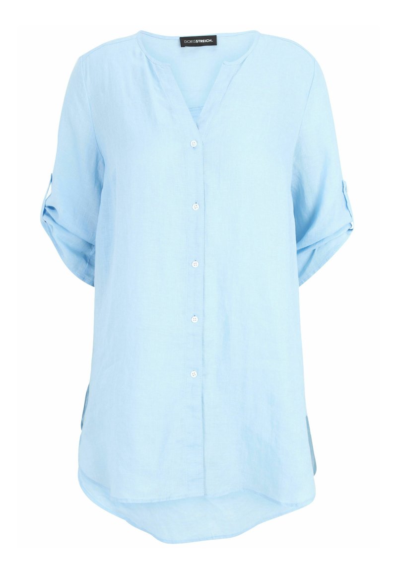 Light blue button-up shirt made of linen, featuring a V-neck, roll-up sleeves, and side slits. Smooth texture with a relaxed fit.
