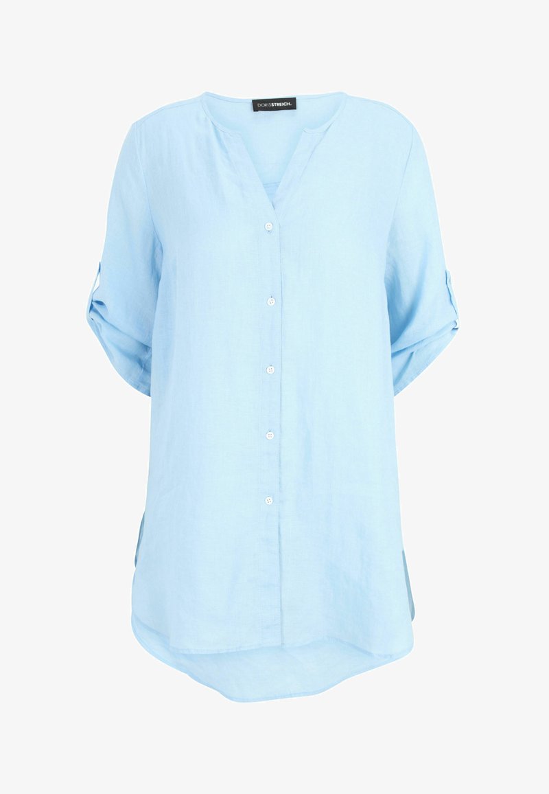 Light blue button-up shirt made of linen, featuring a V-neck, roll-up sleeves, and side slits. Smooth texture with a relaxed fit.