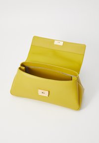 Yellow leather clutch bag with a structured shape, a front clasp closure, and a smooth texture. Interior is lined with grey fabric.