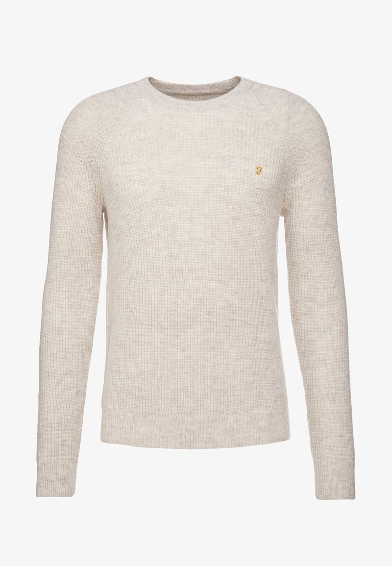 Pull en tricot beige à manches longues avec col rond, orné d'un petit logo jaune brodé sur le côté gauche de la poitrine.